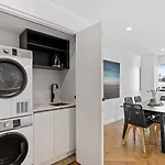 Sleek City Pad With A Garden Rooftop